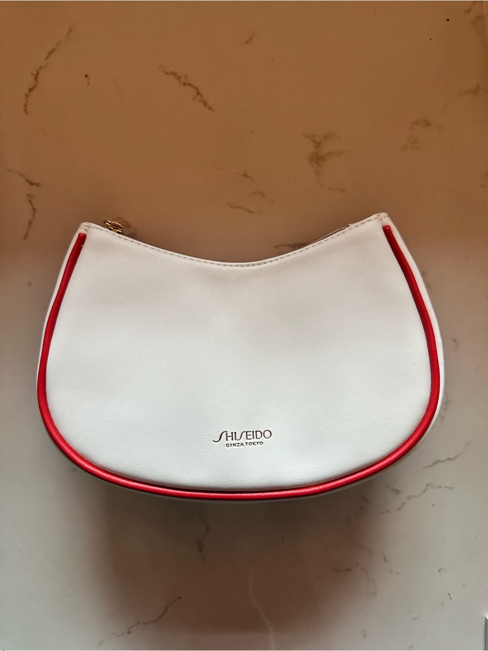 Shiseido White Cosmetic Pouch with Red Trim